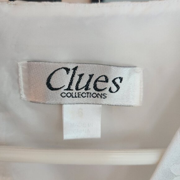 Elegant White Sleeveless Dress - Picture 2 of 7